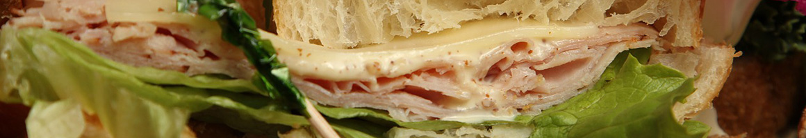 Eating Sandwich Vegan Vegetarian at Back to Eden Vegan Vegetarian Cafe restaurant in Flagler Beach, FL.